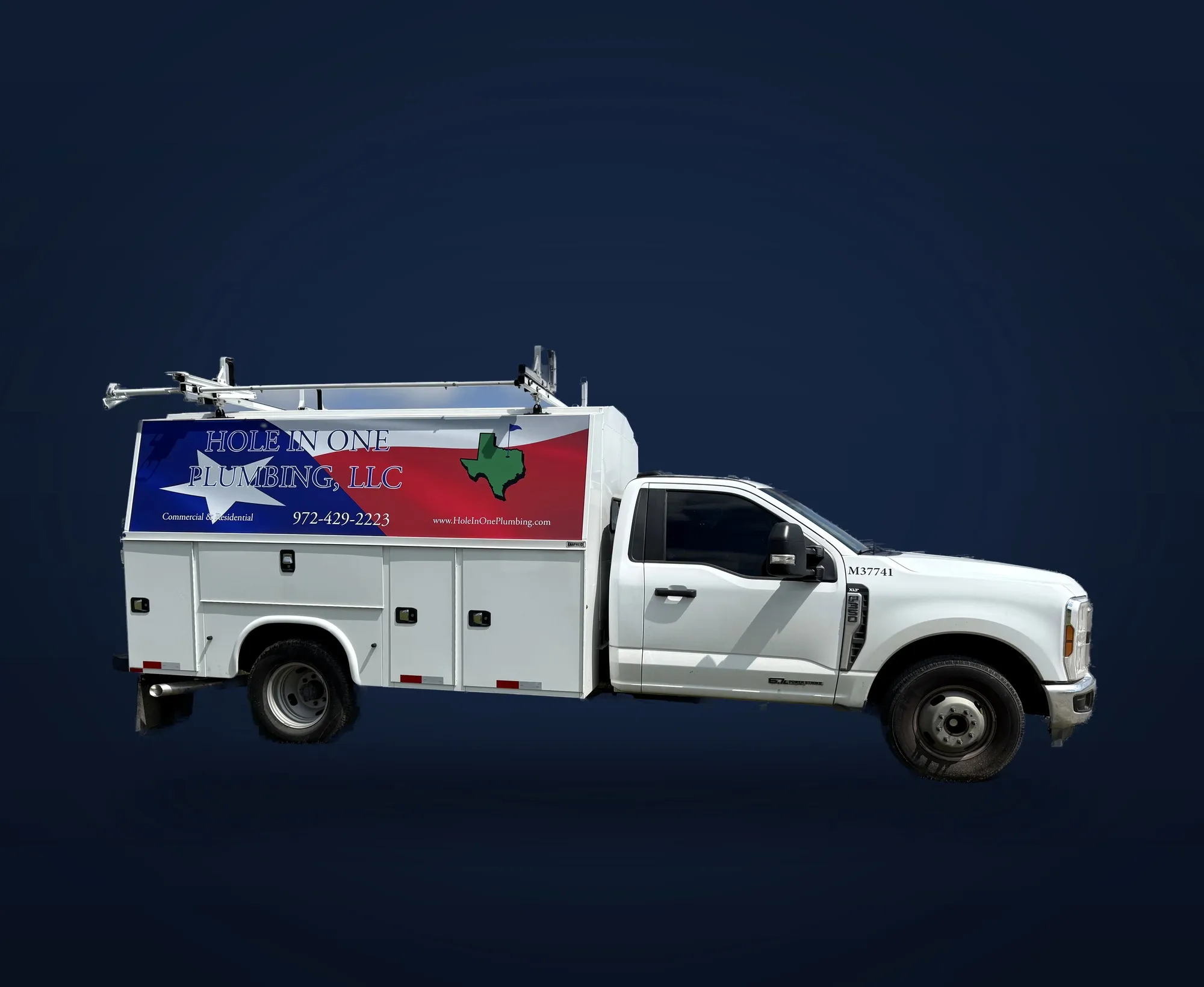 Hole in One Plumbing service truck with Texas-flag branding on the utility bed